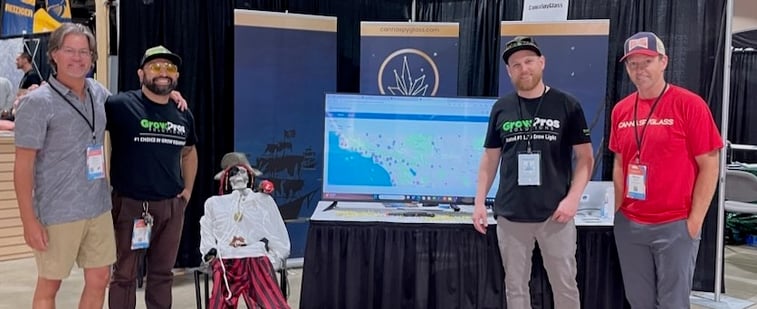 Various team members from CannaSpyglass at their booth at CannaCon LongBeach. CannaSpyglass is a leading cannabis market data provider within the cannabis industry.