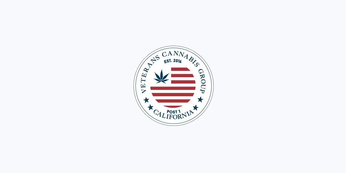 Logo of the Veterans Cannabis Group, a partner of CannaSpyglass, a cannabis technology company specializing in data analytics services. The logo features the red stripes of the USA flag and cannabis leaf, encircled by a blue and white ring with the group's name.